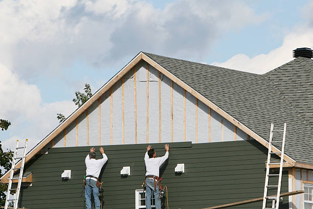 Professional Siding technician working in Forest City, NC